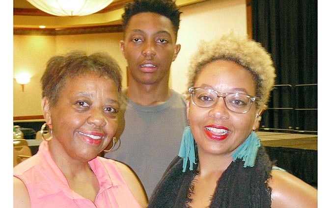 
Annette Driver, left, is pictured last week with her daughter Aileen Woods and Woods' son Domonick Brown. Driver and Woods reconnected recently after Driver gave her daughter up for adoption 38 years ago.