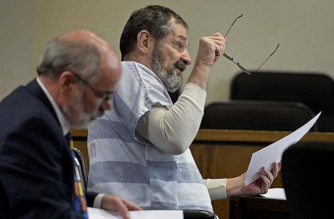 Frazier Glenn Miller Jr. gestures while addressing the judge during pre-trial motions for his case at Johnson County District Court on Friday, July 17, 2015, in Olathe, Kan. A judge rejected a series of defense motions Friday in the death penalty case of the white supremacist charged with killing three people last year at two Jewish sites in Kansas. (Tammy Ljungblad/The Kansas City Star via AP) 