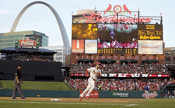 St. Louis Cardinals' Randal Grichuk rounds the bases after hitting a two-run home run during the fifth inning of a baseball game against the New York Mets on Saturday, July 18, 2015, in St. Louis. 