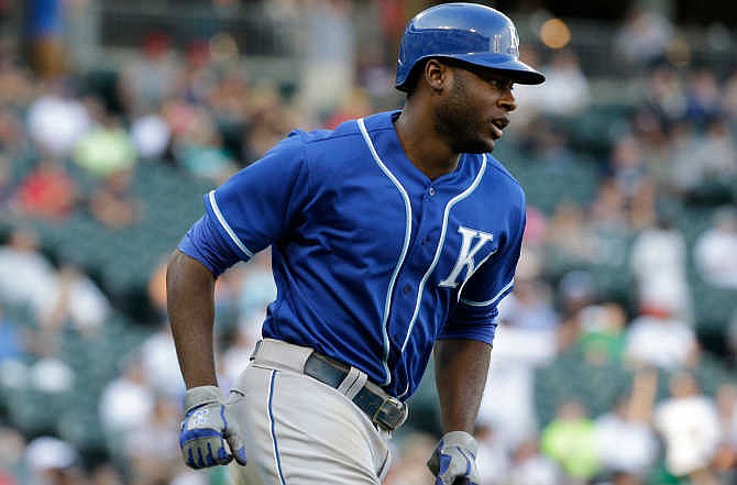 Kansas City Royals' Lorenzo Cain rounds the bases after hitting a solo home run during the13th inning of a baseball game against the Chicago White Sox Saturday, July 18, 2015, in Chicago. The Royals won 7-6.