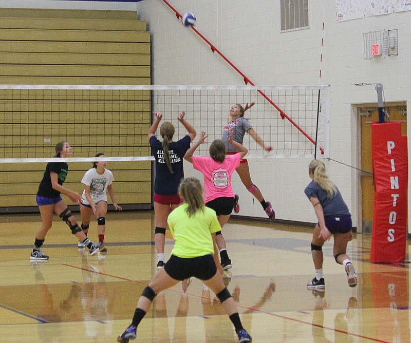 Cameron Meyer spikes a ball Monday, July 20, during practice. The Lady Pintos practiced Monday through Wednesday at the high before traveling to the Lake of the Ozarks for games.