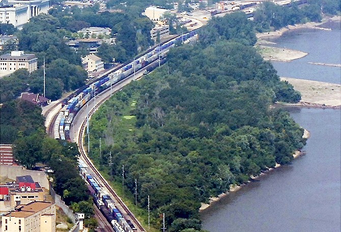 The wooded tract of land known as Adrian's Island is sandwiched between railroad tracks and the south side of the Missouri River in Jefferson City. (2006 file photo)