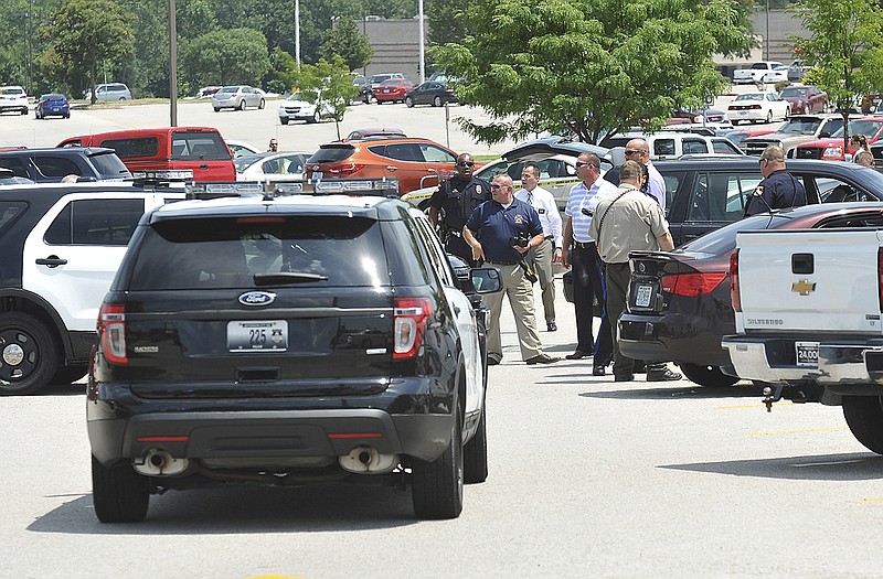 Numerous members of law enforcement and emergency medical staff responded to a call that a woman had been shot in the parking lot at Hy-Vee early Monday afternoon.
