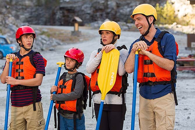 This photo provided by Warner Bros. Pictures shows, Skyler Gisondo, from left, as James Griswold, Steele Stebbins as Kevin Griswold, Christina Applegate as Debbie Griswold, and Ed Helms as Rusty Griswold, in a scene from New Line Cinema's comedy "Vacation," a Warner Bros. Pictures' release. 