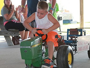 One of the highlights at the 2015 Kingdom of Callaway County Fair was the kids tractor pull, which drew dozens of excited participants. (Fulton Sun photo by Stephanie Hampton)