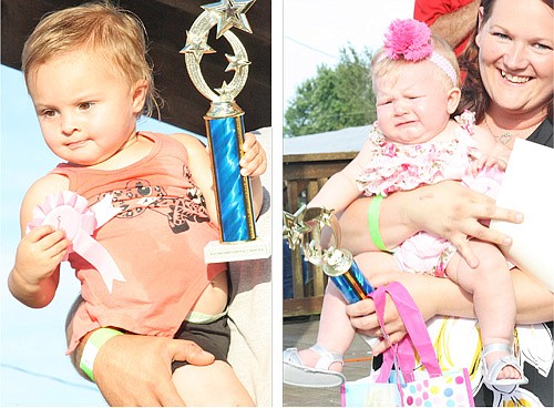 (Left) Lily Scoggins holds her ribbon and first place trophy after winning the one year old division of the Baby Contest at the Kingdom of Callaway County Fair, Thursday, while (right) Mckenzie Durham cries while receiving first place in the 0-6 month division.  Fulton Sun photos by Taylor Malottki