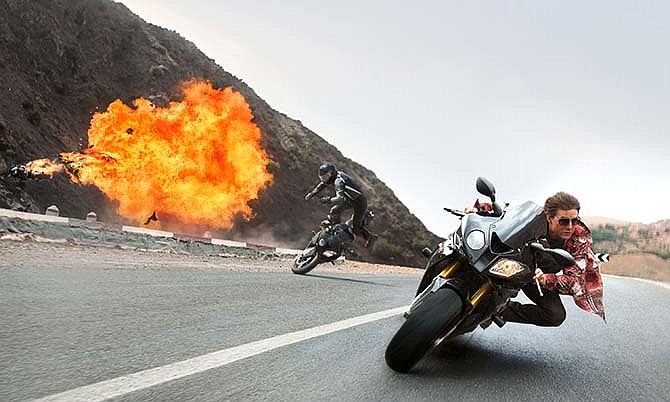 In this image released by Paramount Pictures, Tom Cruise appears in a scene from "Mission: Impossible - Rogue Nation."