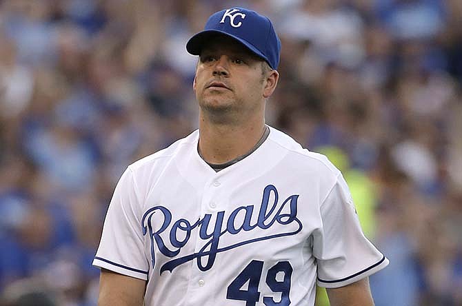 Kansas City Royals relief pitcher Joe Blanton walks off the field after pitching during the second inning of a baseball game against the Pittsburgh Pirates Tuesday, July 21, 2015, in Kansas City, Mo.