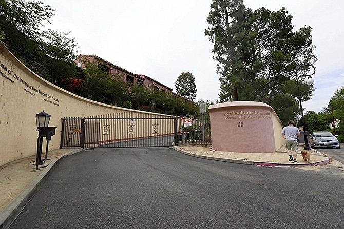 This photo shows the gate to the Sisters of the Immaculate Heart of Mary property in the Los Feliz area of Los Angeles. A Los Angeles judge was scheduled to hear arguments on Thursday about who has the right to sell a hilltop convent that is the subject of competing offers from pop superstar Katy Perry and a local businesswoman. 
