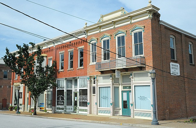 Built in the later 1800s, the brick storefronts of the Gray-Woods Buildings were listed on the National Register of Historic Places in 1984.
