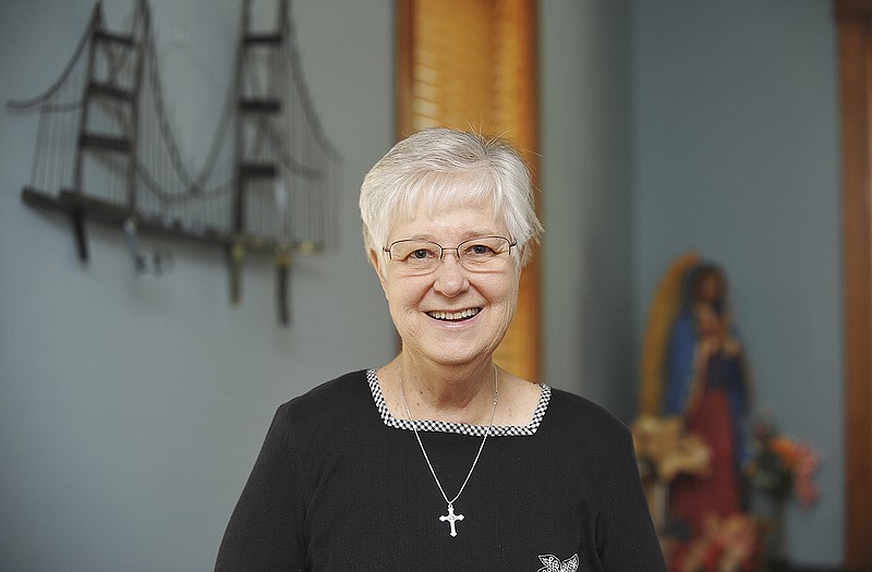 Julie Smith/News Tribune
Sr. Peggy Bonnot poses in the conference room at El Puente Hispanic Ministry.