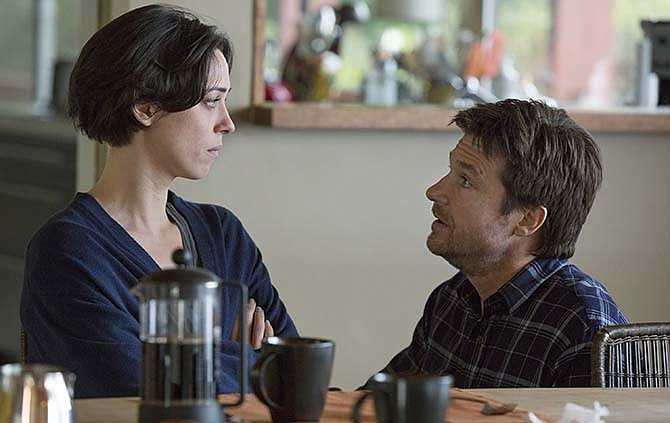 This photo provided by STX Productions LLC shows, Rebecca Hall, left, and Jason Bateman, in a scene from the film, "The Gift." The movie opens in US. theaters on Aug. 7, 2015.