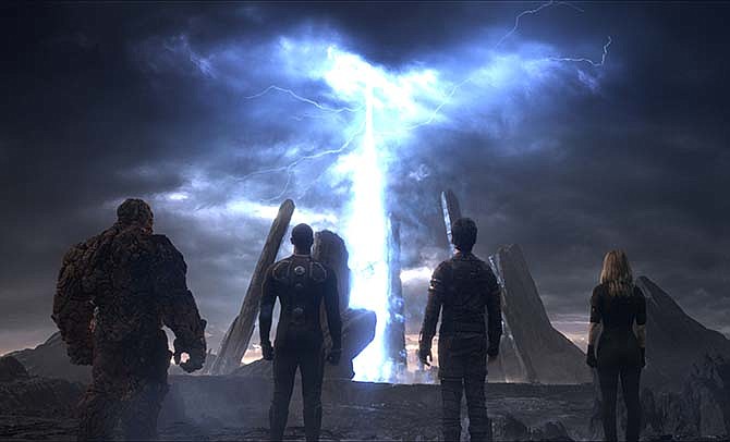 This photo provided by courtesy Twentieth Century Fox shows, The Thing, from left, Michael B. Jordan as Johnny Storm, Miles Teller as Dr. Reed Richards, and Kate Mara as Sue Storm, in a scene from the film, "Fantastic Four," 