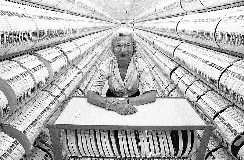 In this Aug. 12, 1985 photo, Lillie Steinhorn, 74, stands inside the computer tape storage room at the headquarters of the Social Security Administration in Baltimore. She began work for the agency in 1936, a year after the Social Security Act was signed into law. 