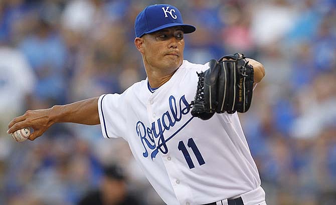 Kansas City Royals pitcher Jeremy Guthrie throws in the first inning of a baseball game against the Los Angeles Angels at Kauffman Stadium in Kansas City, Mo., Thursday, Aug. 13, 2015.