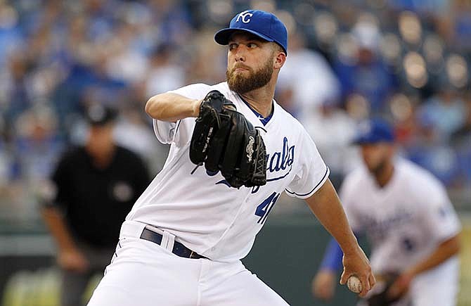 Kansas City Royals pitcher Danny Duffy throws in the first inning of a baseball game against the against the Los Angeles Angels at Kauffman Stadium in Kansas City, Mo., Friday, Aug. 14, 2015.