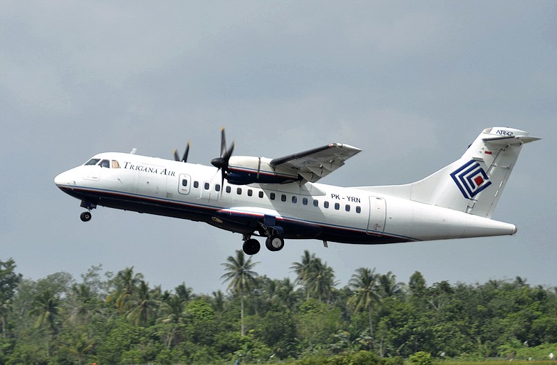 A Trigana Air Service's ATR42-300 twin turboprop plane takes off at Supadio airport in Pontianak, West Kalimantan, Indonesia. The same type of a Trigana airliner carrying 54 people was missing Sunday after losing contact with ground control during a short flight in bad weather in the country's mountainous easternmost province of Papua.