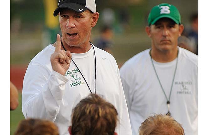 Blair Oaks head football coach Terry Walker talks to his team after the August 2015 Jamboree in Wardsville, Mo.