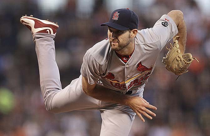 St. Louis Cardinals pitcher Michael Wacha watches a delivery to the San Francisco Giants during the first inning of a baseball game Friday, Aug. 28, 2015, in San Francisco.