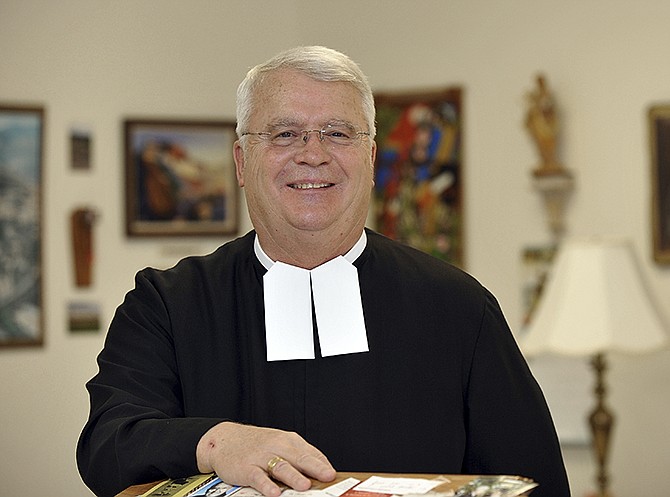 Brother Steven Schonhoff poses in his classroom at Helias High School. He's been a teacher for 44 years and spent the last 24 at Helias.