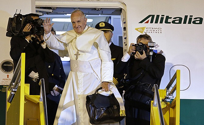 Pope Francis waves goodbye in July before boarding a plane in Asuncion, Paraguay, that took him back to Rome, after a week long tour in South America. When Pope Francis sets foot on the tarmac Sept. 22 at Andrews Air Force Base near Washington, it won't just be his first time in the United States as pontiff. It will be his first time in the country - ever in his life. 