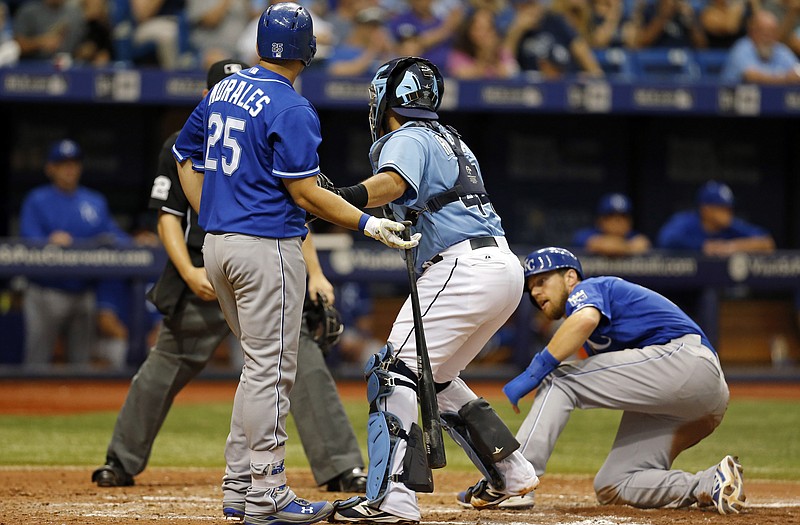 Rays catcher Rene Rivera tags Kendrys Morales of the Royals after previously tagging out Ben Zobrist (right) to complete a double play during the eighth inning of Sunday afternoon's game in St. Petersburg, Fla.