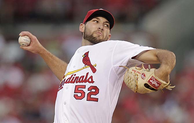 St. Louis Cardinals starting pitcher Michael Wacha (52) pitches in a baseball game against the Pittsburgh Pirates, Wednesday, Aug. 12, 2015, in St. Louis. 