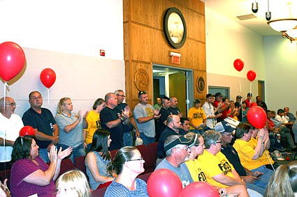 An estimated crowd of 50 family members and supporters jammed Fulton City Hall Tuesday night as controversy over firefighter's pay continued.  Prior to the meeting, one supporter, Abby Gamblin, said they would keep coming back until the Fulton City Council addressed the issue.