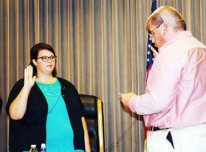 In the opening minutes of the Sept. 8 Fulton City Council meeting, Courtney Crowson (left) was introduced and sworn in as Fulton's new city clerk by Fulton Director of Administration Bill Johnson. Crowson succeeds Carolyn Laswell, who retired after serving the city for 22.5 years.
