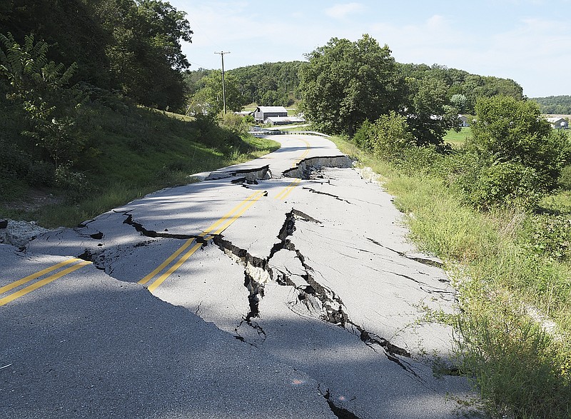 Residents of Lower Bottom Road have to go one way or the other to avoid this gaping hole in the road, which opened up and gave way earlier this summer. The closed road has caused issues for a number of drivers, causing them to backtrack or reroute.