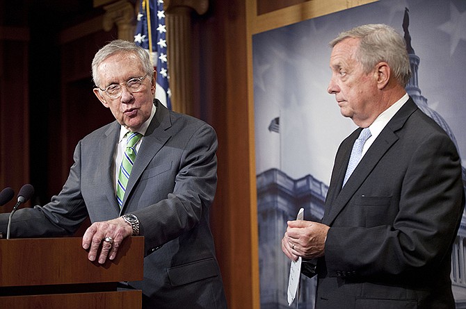Senate Minority Leader Harry Reid of Nev., and Senate Minority Whip Richard Durbin of Ill., participate in a news conference earlier this month on Capitol Hill. Senate Republicans on Tuesday pushed for a final say on the Iran nuclear deal before the congressional review period expires, but Democrats blocked any attempt to undercut the international accord and President Barack Obama's win on a top foreign policy initiative. 