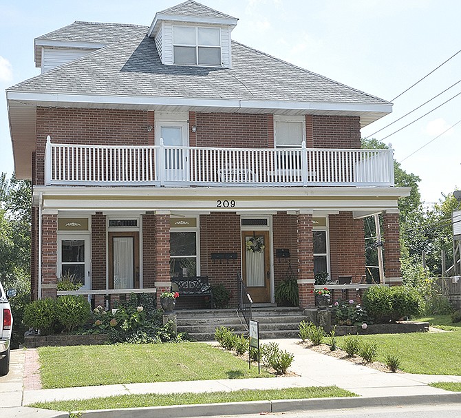 The McGowan residence is seen at 209 Cherry St. Built around 1910, the home located near the Missouri State Penitentiary has been refurbished, assisting in the revitalization of the neighborhood. 