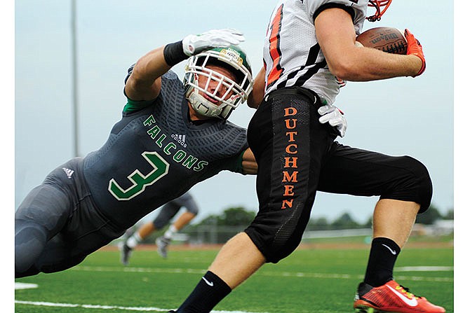 Cody Alexander of
Blair Oaks lunges to
make the stop on
Owensville running
back Tristan Crofford
during a game earlier
this season at the
Falcon Athletic Complex
in Wardsville, Mo.
