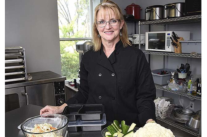 Laurel Dunwoody is seen in the kitchen of her newly opened business, Love2Nourish at
712 Jefferson St. in Jefferson City.