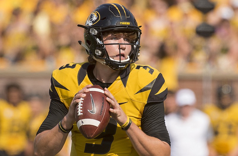 Missouri quarterback Drew Lock looks for a receiver during the second quarter of an NCAA college football game against Southeast Missouri State Saturday, Sept. 5, 2015, in Columbia, Mo.