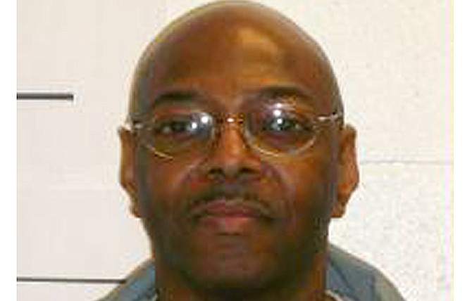 This Feb. 10, 2014 photo provided by the Missouri Department of Corrections shows Kimber Edwards. The former St. Louis jailer was convicted of hiring Orthell Wilson to kill his ex-wife, Kimberly Cantrell, in 2000 in her suburban St. Louis apartment. His death sentence has been commuted to life in prison without the possibility of parole.
