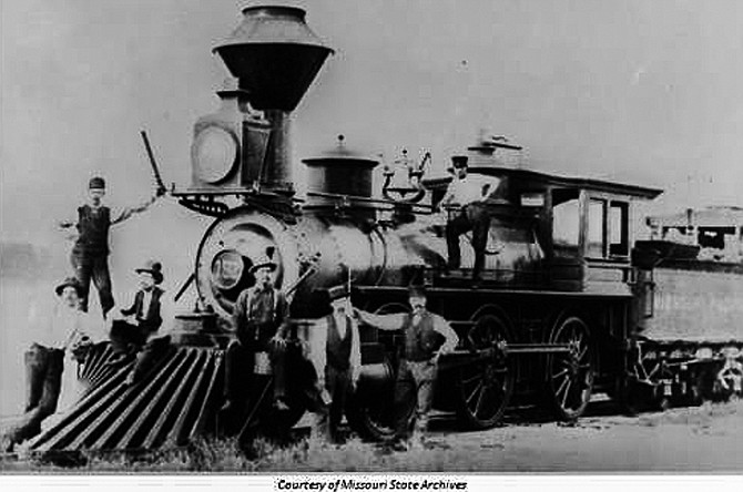 
This photo of the Missouri Pacific train No.
152 shows men posed on and around it.