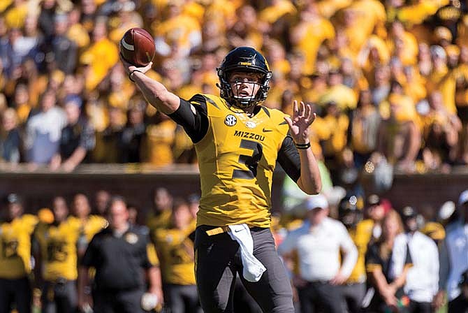 Missouri quarterback Drew Lock passes in the third quarter of the Tigers' win Saturday against South Carolina in Columbia.