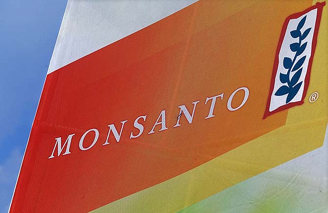 This Monday, Aug. 31, 2015 photo shows the Monsanto logo at the Farm Progress Show in Decatur, Ill.