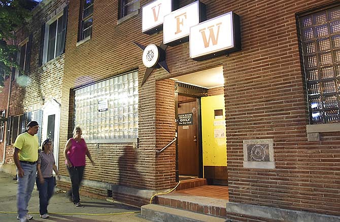 
Revelers in a recent downtown street party
walk past the VFW Post 1003 on Capitol Avenue in Jefferson City.
The decision to close VFW Post 1003 was
recently made and soon the post will transition
to a Post in St. Martins.