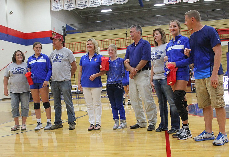 Three seniors were recognized Monday night on senior night.

Front left to right, Kelly, Adrienne and David Strickfaden; Jill, Ally and Jerry Meisenheimer; Christiane, Ashtyn and Kenny Goans.