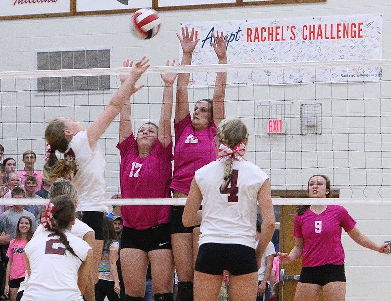 California's Gracie George (left) and Adrienne Strickfaden (right) combine for a block against Osage last Thursday.