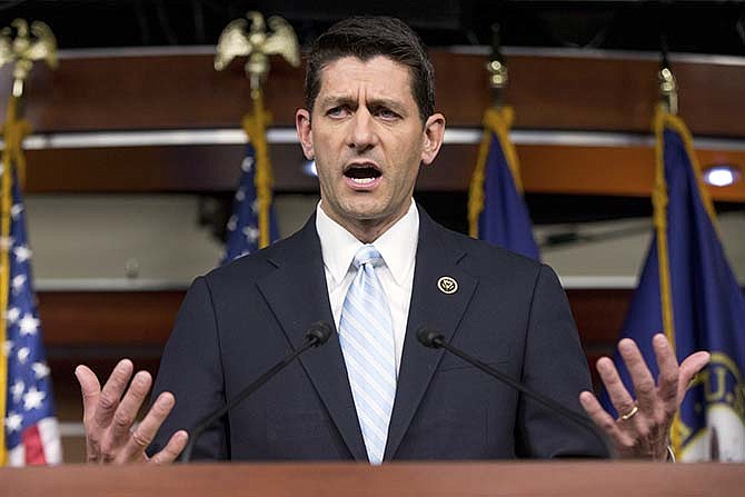 Rep. Paul Ryan, R- Wis., speaks at a news conference following a House Republican meeting, Tuesday, Oct. 20, 2015, on Capitol Hill in Washington. Ryan told GOP lawmakers that he will run for speaker, but only if they embrace him by week's end as their consensus candidate, an ambitious bid to impose unity on a disordered and divided House. 