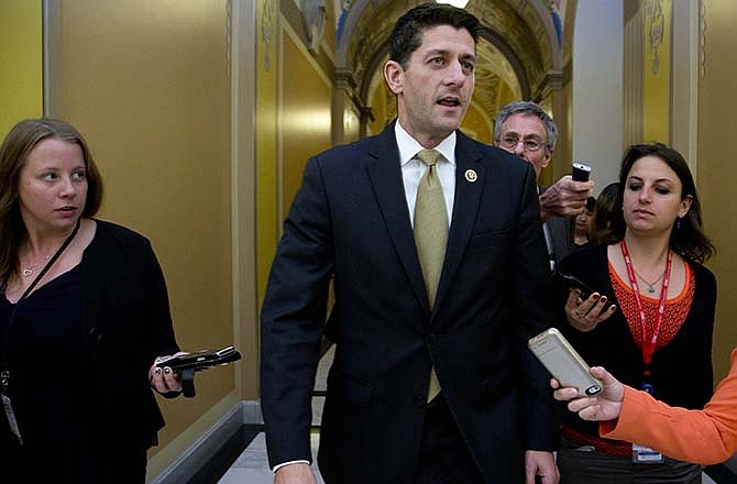 Rep. Paul Ryan, R-Wis., speaks to reporters on Capitol Hill in Washington, Wednesday, Oct. 21, 2015, following meetings with House Republican leaders and the Freedom Caucus members. Ryan seeking unity in a place it's rarely found, is telling House Republicans he will serve as their speaker only if they embrace him by week's end as their consensus candidate.