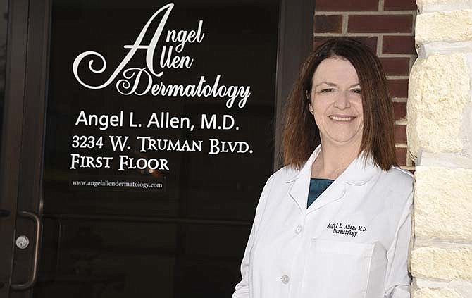 Dr. Angel Allen stands outside her West Truman Boulevard dermatology practice. Allen spent her first five years practicing dermatology working for someone else, but said going into business for herself has made her a better doctor.