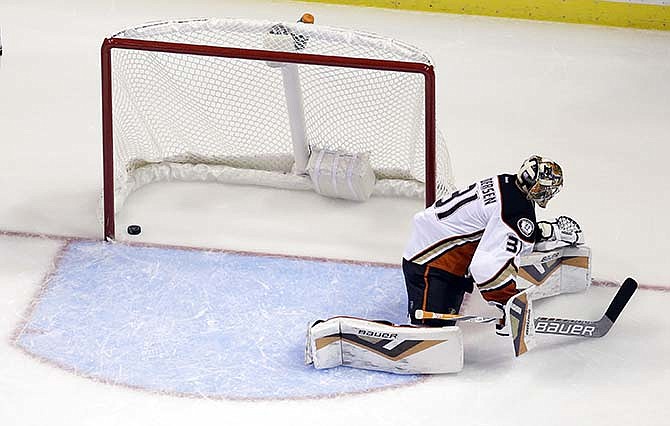 Anaheim Ducks goalie Frederik Andersen, of Denmark, pauses after a shot by St. Louis Blues' Colton Parayko rebounded off the boards and off his skate and into the net for a goal during the third period of an NHL hockey game Thursday, Oct. 29, 2015, in St. Louis. The Blues won 2-1.