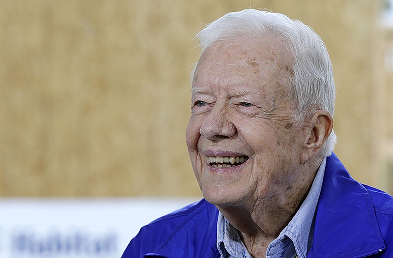 Former President Jimmy Carter is interviewed at a Habitat for Humanity worksite in Tennessee.