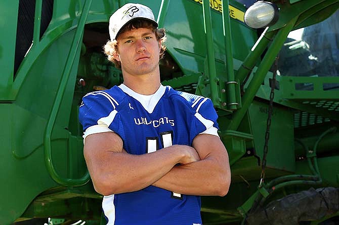 This May 16, 2015 photo provided by Everett Royer shows Luke Schemm near Atwood, Kan. The Kansas high school football player has been declared brain-dead according to a hospital spokeswoman at a Colorado hospital after collapsing on the sideline during a state playoff game Tuesday, Nov. 3, 2015. (Everett Royer via AP) 