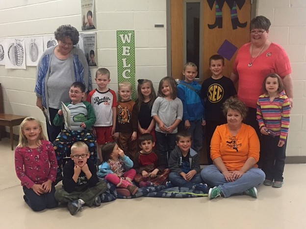 Participants in Reading Night were, front row, left to right, Margaret Heimericks, Abraham Heimericks, Lizzie Baepler, Noah Baepler, Hayden Clay and Lou Ann Wolfe; back row, Karen Jones, Abraham Baepler, Sheperd Lawson, Emery Lawson, Isabel Lund, Hadley Clay, Owen Gentzsch, Hudson Clay, Lori Porter and Zoey Borts