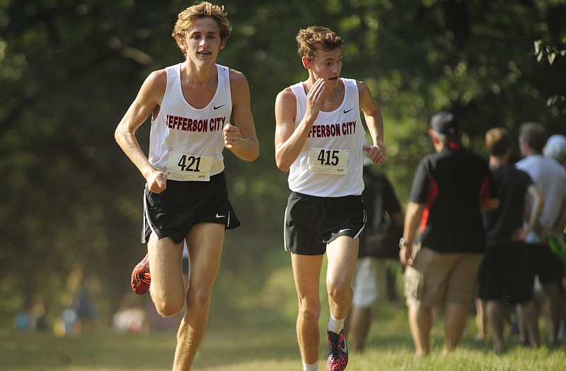 Jefferson City teammates Jackson Schwartz (left) and Saxon Teubner will bid for all-state honors today in the Class 4 state cross country championships at the Oak Hills Golf Center.